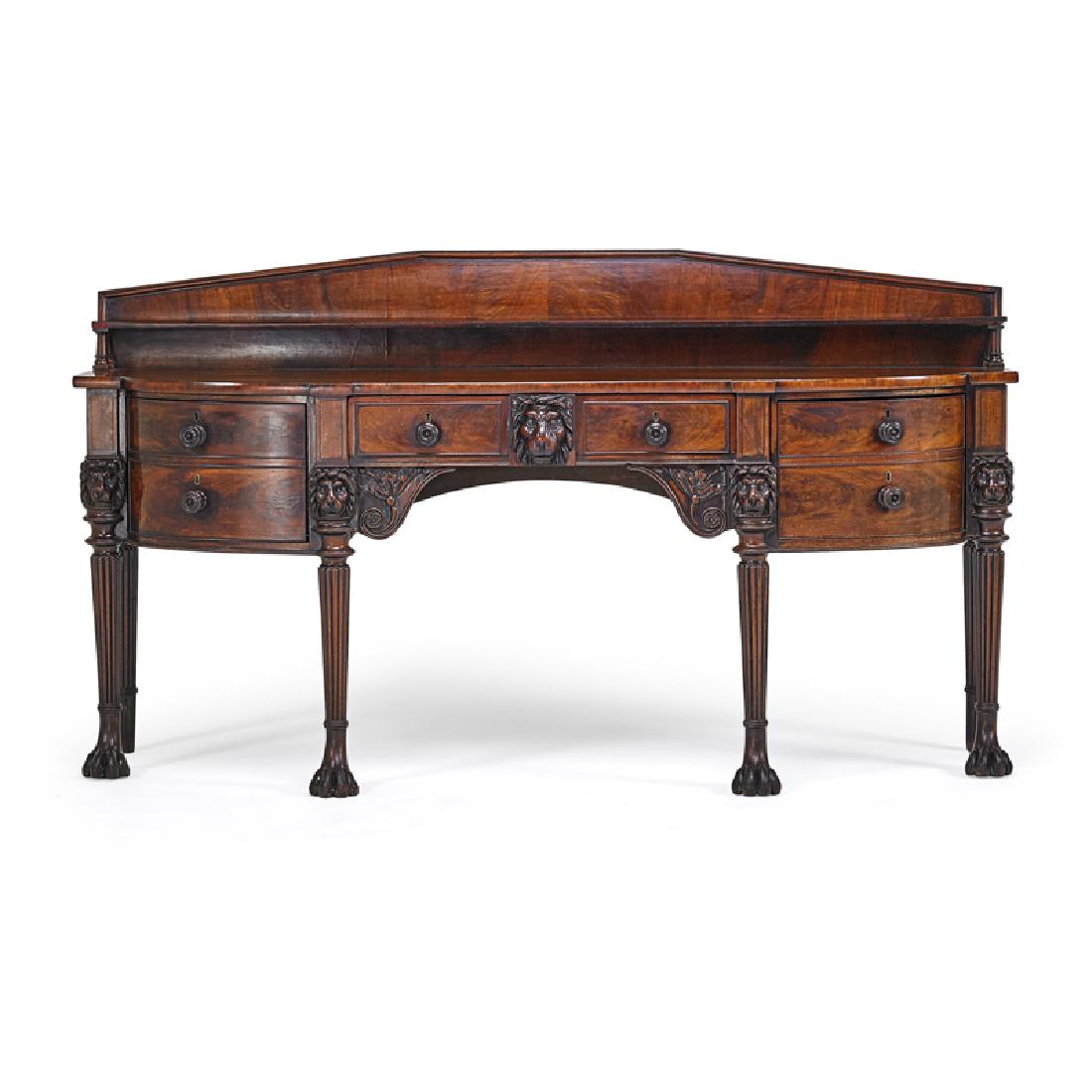 REGENCY MAHOGANY SIDEBOARD: In the manner of Thomas Hope, carved lion head details with paw feet and cellarette drawer, England, 19th c. 48 1/2" x 87" x 25 1/2"
