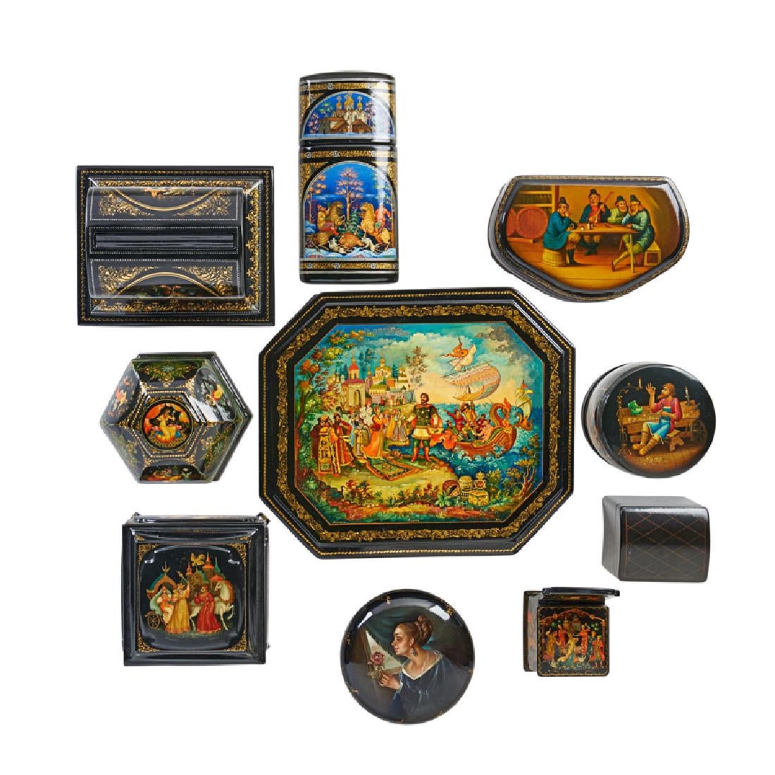 RUSSIAN LACQUER BOXES: Ten: Including a Mstiora cigar box and a Mstiora octagonal box, Russia, late 20th c. Most marked, some signed Octagonal box: 1 3/4" x 9" x 7 3/4"