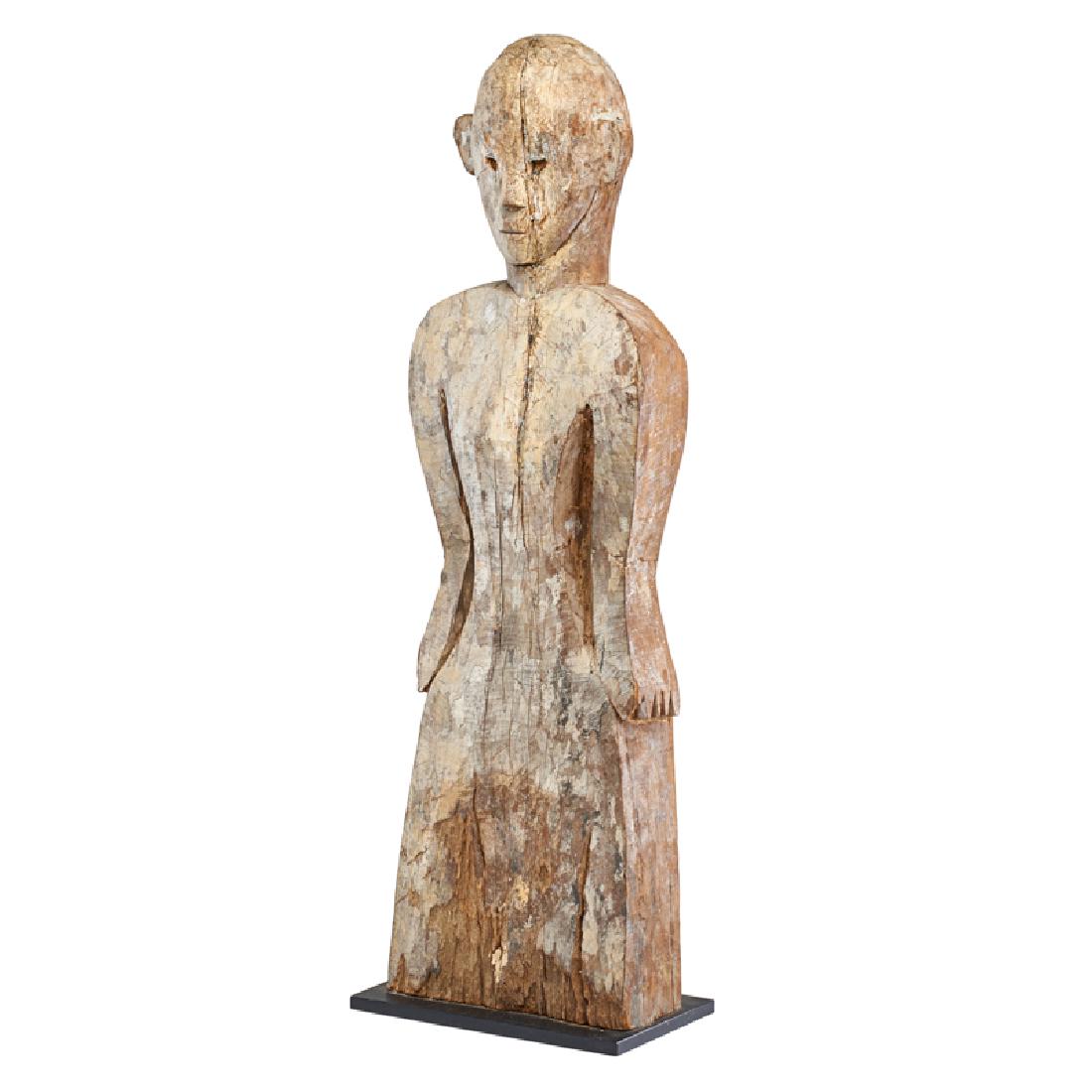 DAYAK HAMPATONG ANCESTRAL FIGURE: Anthropomorphic post statue mounted to a black metal base, Borneo, Indonesia, late 19th/early 20th c. 32 1/4" x 9 3/4" x 4"