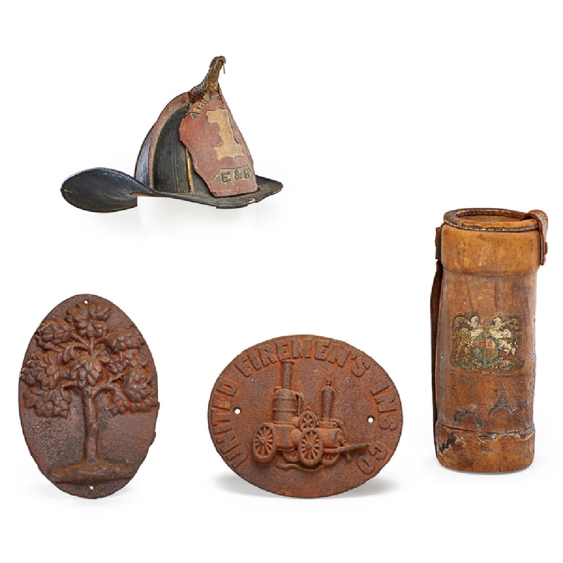 FIREMAN'S GROUPING: Four: Embossed and stenciled eagle finial leather helmet, leather fireman's bucket, United Fireman's Ins. Co. cast iron building plaque, and a cast iron building plaque with tree, USA, 19th/20th c. He