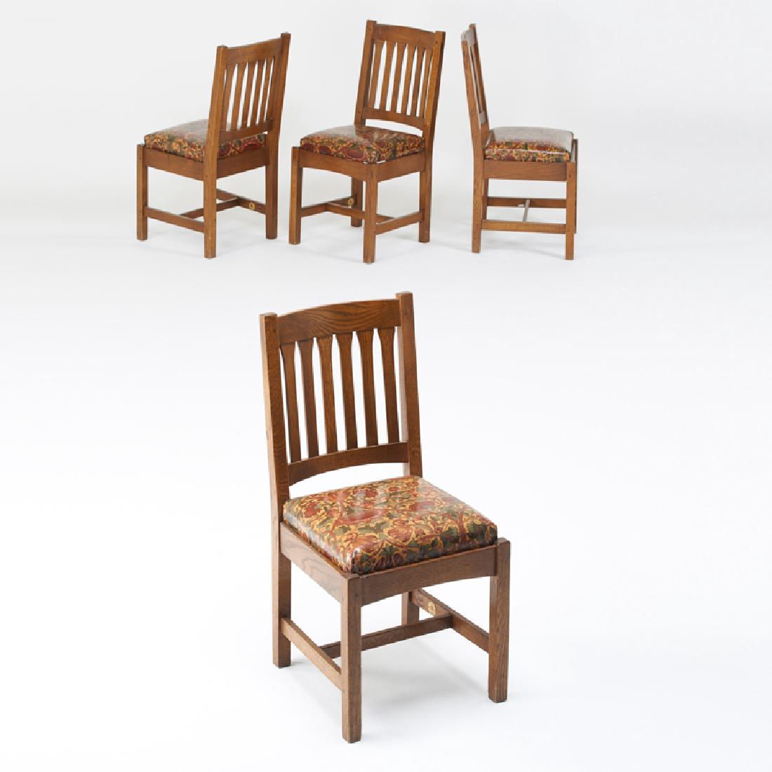 STICKLEY; E.J. AUDI: Four contemporary side chairs modeled after L&JG Stickley, #323 with Liberty of London style oilcloth upholstery, Manlius, NY, ca. 1990s; Quartersawn oak; Metal tag, branded mark; 37 1/2" x 13" x 19"