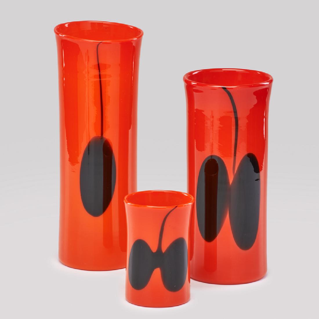 HEIKKI ORVOLA; NUUTAJARVI NOTSJO: Three opaque orange glass vases with black inclusions, Finland, ca. 1970; All signed, one with "Arabia Wartsila" silver decal; Tallest: 12" x 4 1/2" dia.
