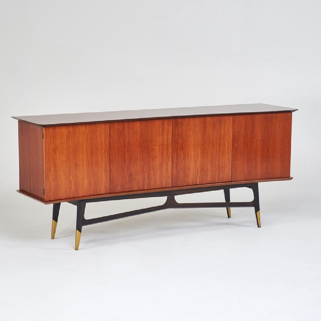 EUROPEAN: Credenza, ca. 1960; Ebonized wood, brass, mahogany; Unmarked; 37" x 86 1/2" x 21 1/2"