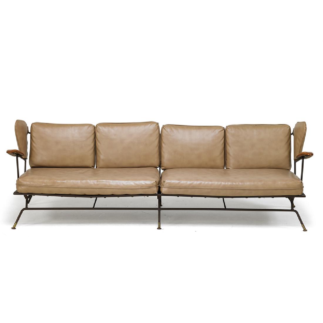 STYLE OF ADRIAN PEARSALL: Sofa, Wilkes-Barre, PA, 1960s; Enameled steel, stained wood, vinyl; Retailer labels; 28 1/2" x 88 1/2" x 29"