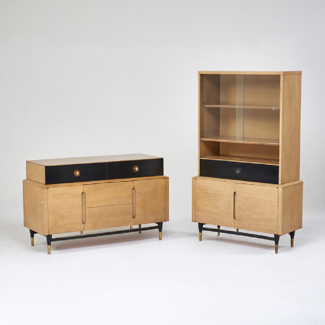 AMERICAN OF MARTINSVILLE: Tall cabinet and sideboard, USA, 1950s; Bleached mahogany, ebonized wood, brass, glass; Tall: 63" x 38 1/2" x 15", shorter: 31" x 50 1/2" x 19 1/2"