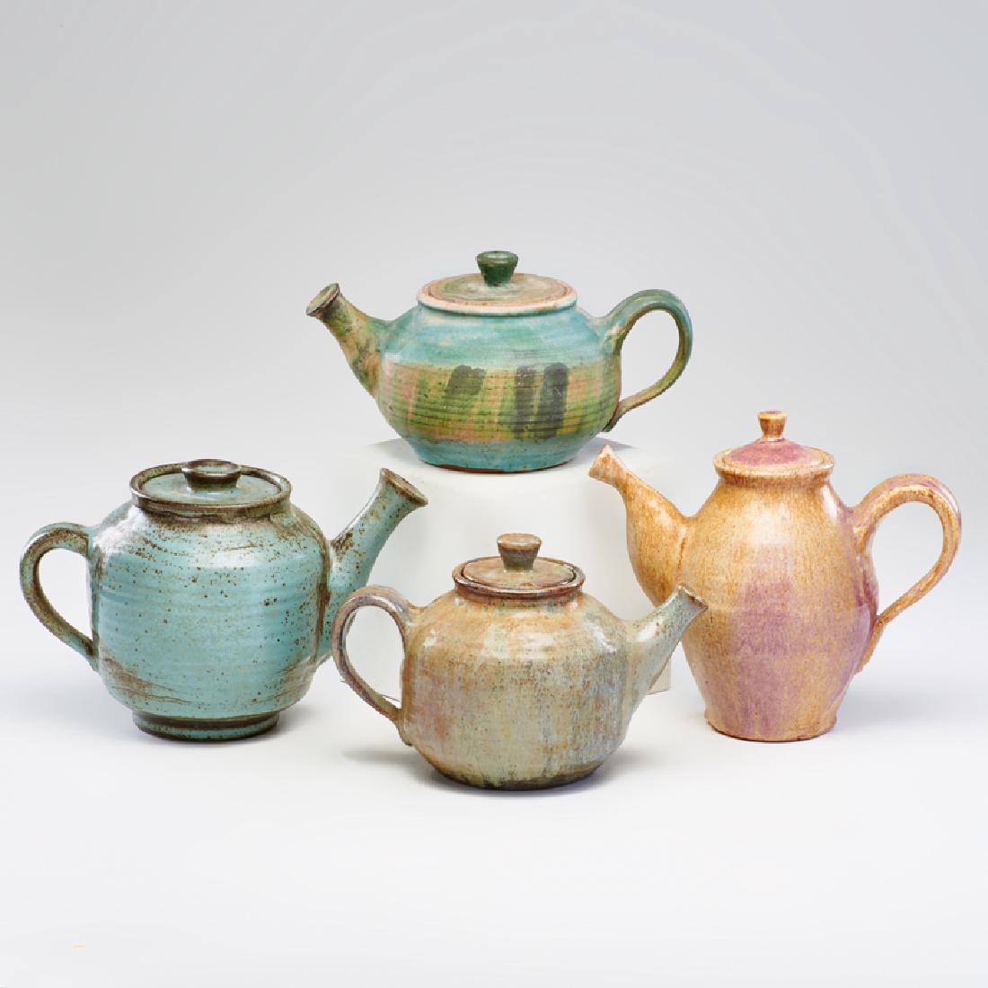 KA-KWONG HUI (1922-2003): Four earthenware teapots in various glazes, USA, mid-late 20th c.; Unmarked; Tallest: 8"