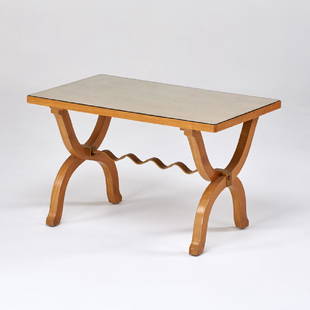 MAISON RAMSAY: Coffee table, France, 1940s; Sycamore, brass stretcher, glass; Unmarked; 22" x 35 1/2" x 21 1/2"