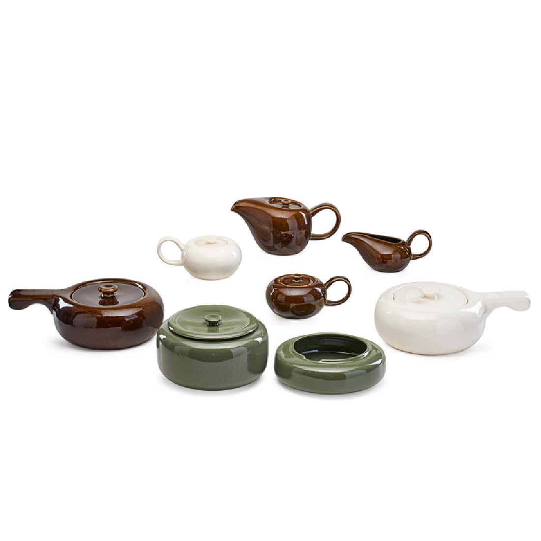 RUSSEL WRIGHT American Modern dinnerware, teapots: RUSSEL WRIGHT (1904 - 1976) STEUBENVILLE POTTERY Sixteen pieces of American Modern dinnerware, USA, 1930s Glazed earthenware Most stamped Russel Wright MFG BY STEUBENVILLE Serving bowls: 3 1/2" x 11"