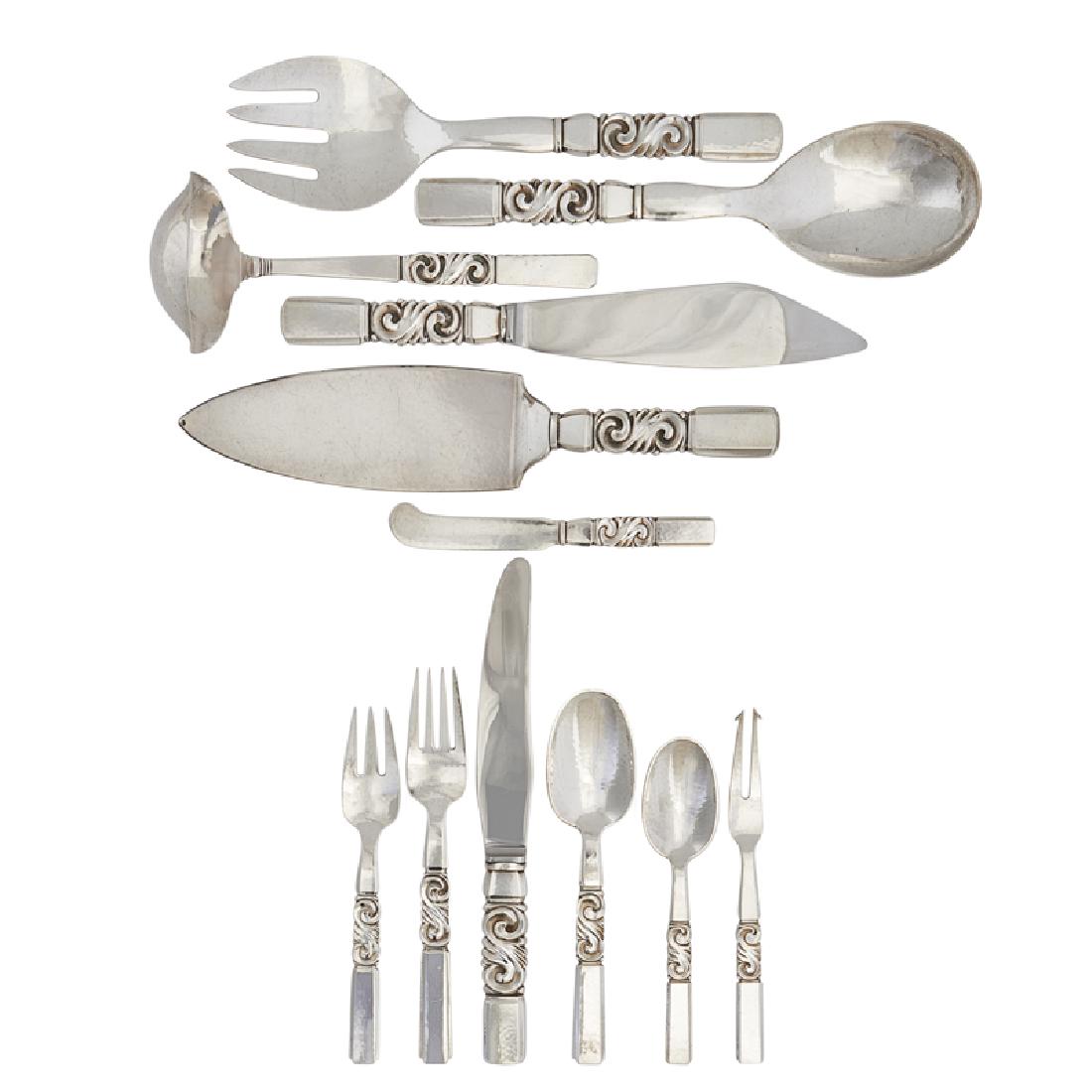 GEORG JENSEN 79-pc Scroll flatware set for twelve: JOHAN ROHDE (1856 - 1935) GEORG JENSEN 79-piece sterling silver six-piece Scroll flatware set for twelve with seven serving pieces, Denmark, after 1945 Post-war Jensen marks Longest: 10 1/4" 122.4 OT
