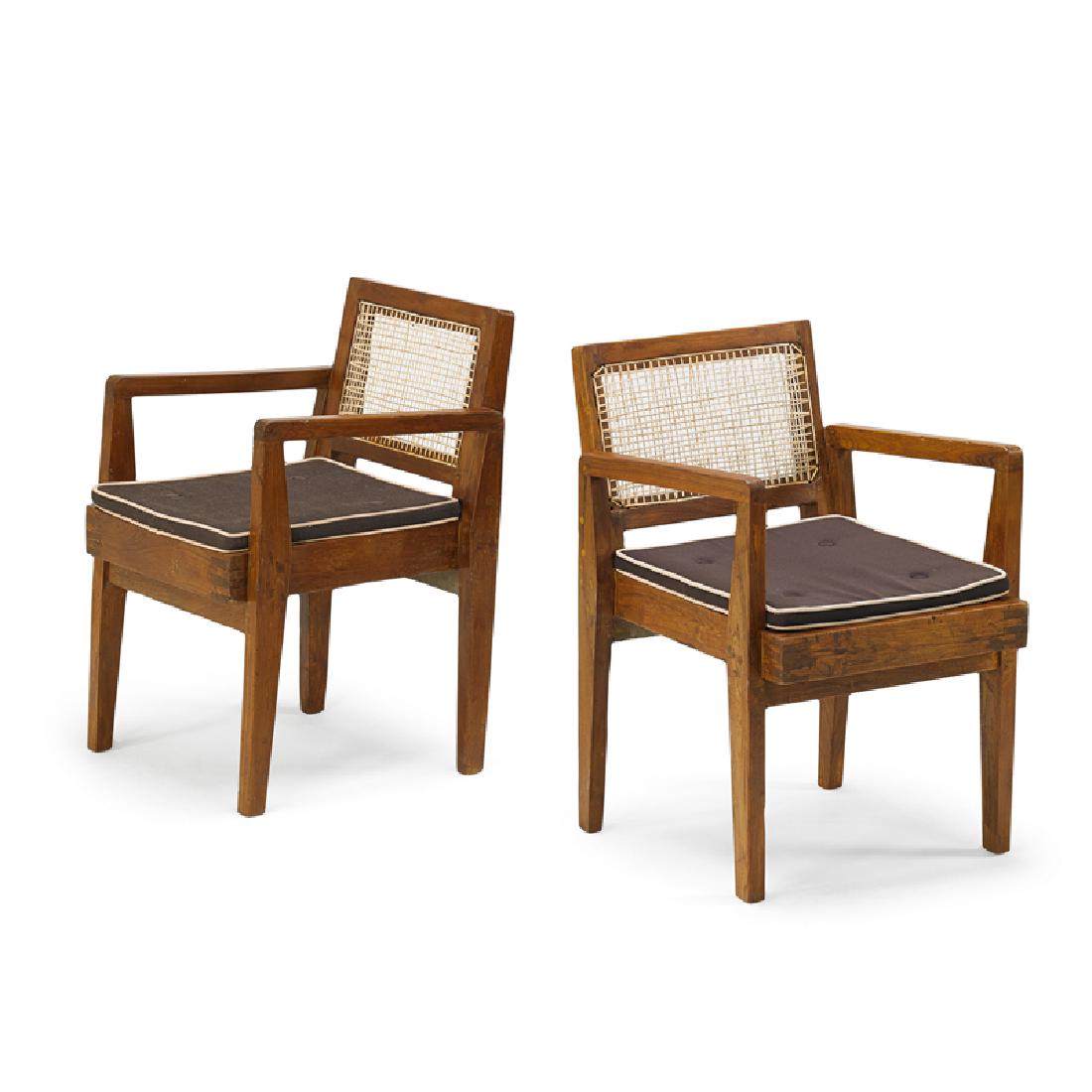 PIERRE JEANNERET Rare pair of Clerk's chairs: PIERRE JEANNERET (1896 - 1967) Rare pair of clerk's chairs from the High Court (no. PJ-SI-20-A), Chandigarh, India/France, 1950s Teak, cane, upholstery Stenciled letters to one Approx. 30 1/2" x 21 3/
