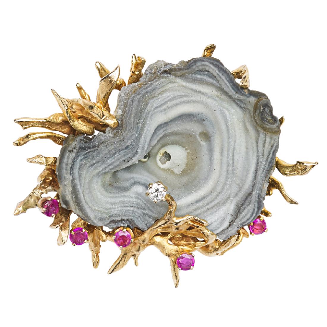 ED WIENER Fine diamond and chalcedony brooch: ED WIENER (1918 - 1991) Fine brooch, New York, ca. 1975 14k gold, RBC diamond (approx. .10ct), ruby, chalcedony Stamped EW 14K 1 1/2" x 2" 17.8 dwt