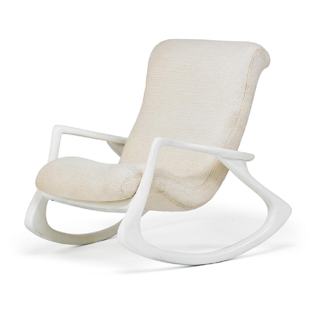 VLADIMIR KAGAN Rocking chair: VLADIMIR KAGAN (1927 - 2016) VLADIMIR KAGAN DESIGNS INC. Rocking chair, New York, 1970s Sculpted and enameled wood, upholstery Unmarked 39" x 32 1/2" x 43"