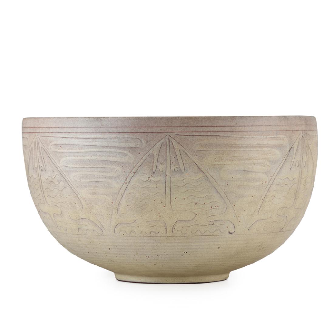 EDWIN AND MARY SCHEIER Fine large bowl: EDWIN SCHEIER (1910 - 2008) MARY SCHEIER (1908 - 2007) Fine large early bowl with incised stylized fish design, Durham, NH, 1950s Glazed earthenware Signed 7" x 12 3/4"