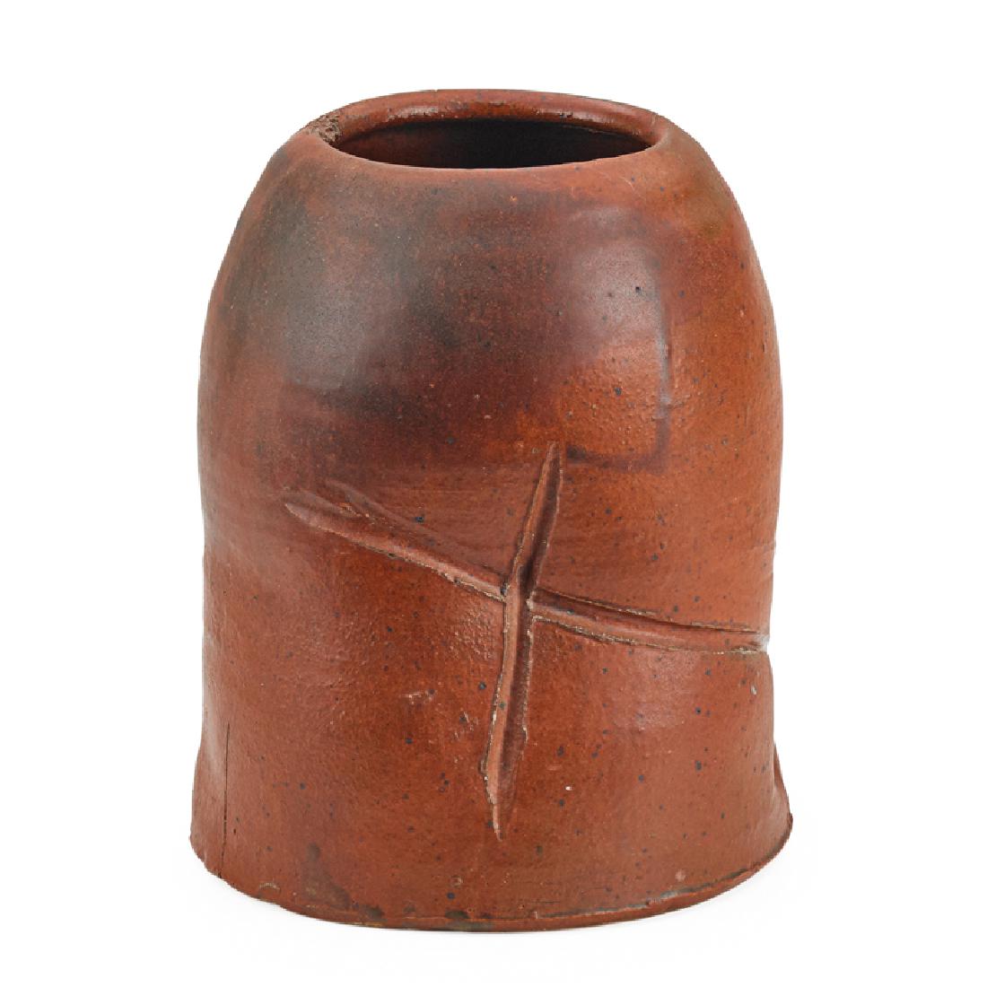 ROBERT TURNER Stoneware vessel: ROBERT TURNER (1913 - 2005) Vessel with incised decoration, Shino glaze, Alfred, NY Glazed stoneware Incised signature 9 1/2" x 8"