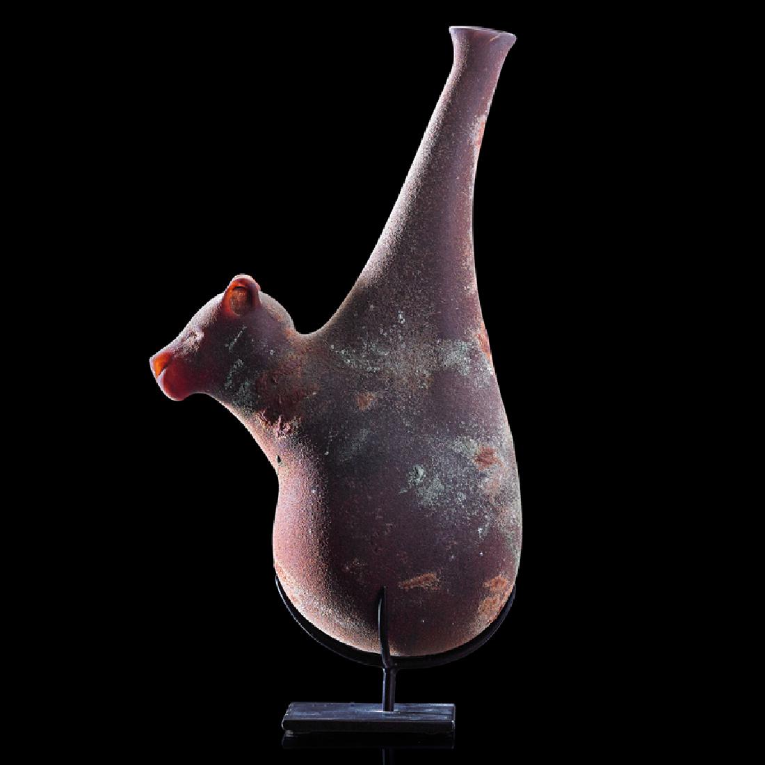 WILLIAM MORRIS Panther Water Vessel: WILLIAM MORRIS (b. 1957) Panther Water Vessel, Washington State, 2001 Blown glass, steel stand Signed and dated On stand: 15" x 4 1/2" x 8"