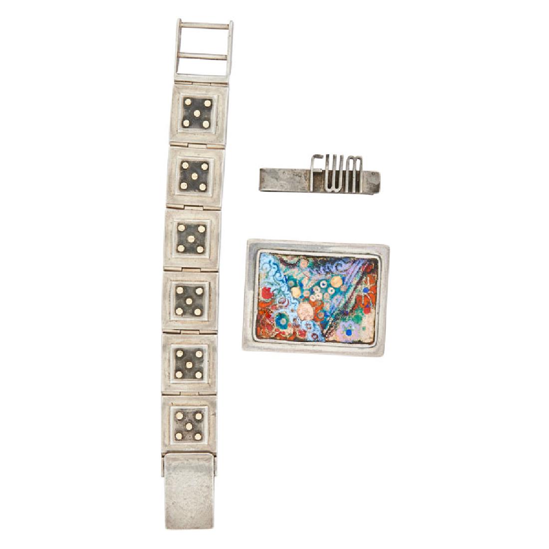 ARTISANAL STERLING JEWELRY OR ACCESSORIES: Comprising a Laurence De Vries substantial link bracelet with gold dot clusters, #001; A Doris Hall floral enameled brooch; An Ed Wiener monogrammed money clip, "FWM". 18k. Stamped or signed by maker.