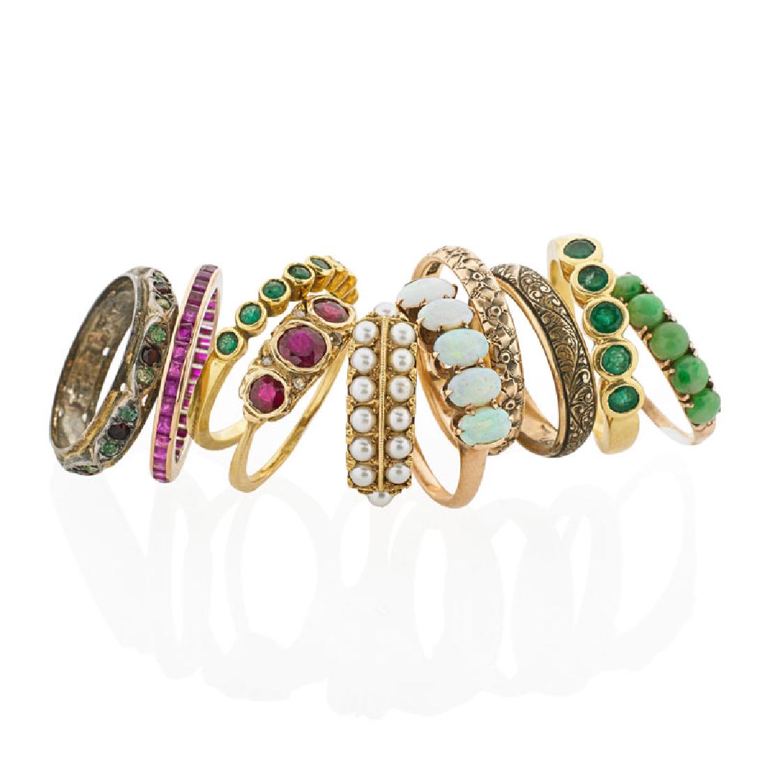 TEN GEM SET GOLD STACKING RINGS (1 of 1)