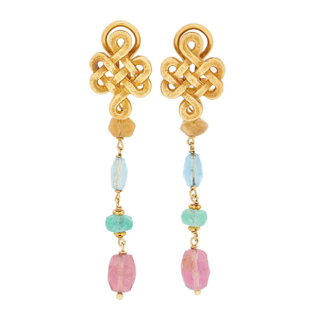 PAOLA FERRO GEM SET YELLOW GOLD EARRINGS: Each designed as a gold knot motif suspending a citrine, aquamarine, green beryl, and pink tourmaline faceted bead drop. 18k. Stamped with Italian control marks. Drop 2 1/4". 6.9 dwt.