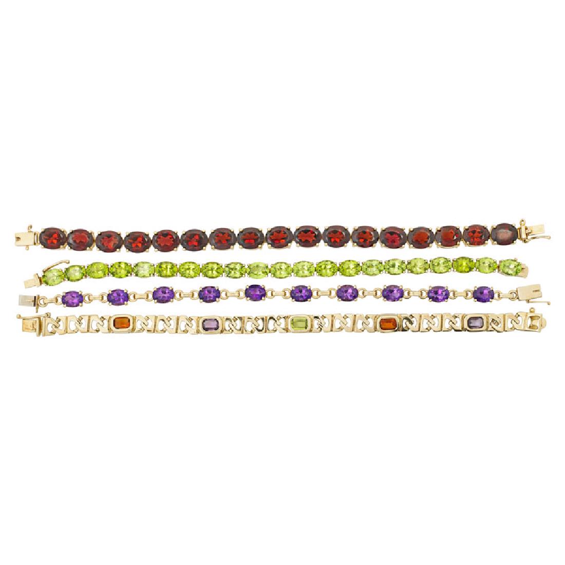 GEMSTONE GOLD LINK BRACELETS: With garnets, amethysts, or peridot; One multi gem bracelet set with citrine, amethyst and peridot. Ca. 1995. 14k. 7". 45.3 dwt. Provenance: From the Estate of Roberta Pierce Klun. Roberta Klun was a