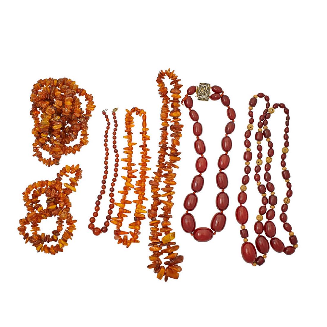 EIGHT AMBER OR CHERRY BAKELITE NECKLACES (1 of 1)