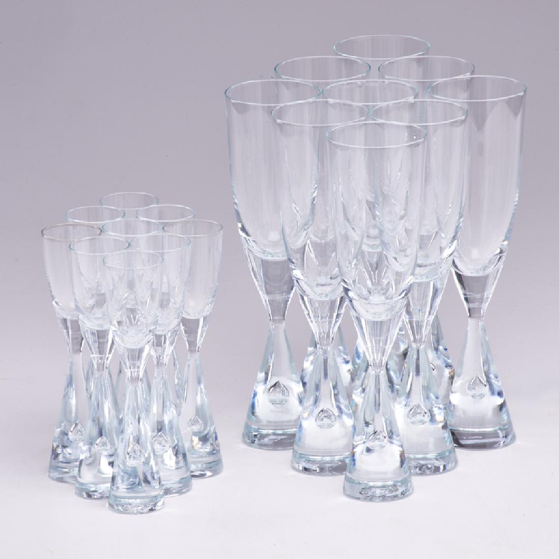 BENT SEVERIN (1925-2012); KASTRUP HOLMEGAARD: "Princess" champagne flutes and cordials with controlled bubble decoration, service for eight plus extras, Denmark, ca. 1970s Glass All with etched marks, some with original paper labels Flute: 8 1/2"