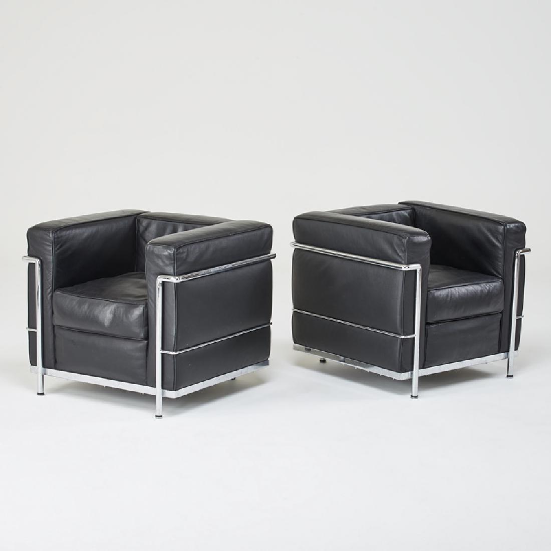 AFTER LE CORBUSIER: Pair of "Petit Confort" lounge chairs, latter half of 20th c. Chromed steel, leather Unmarked