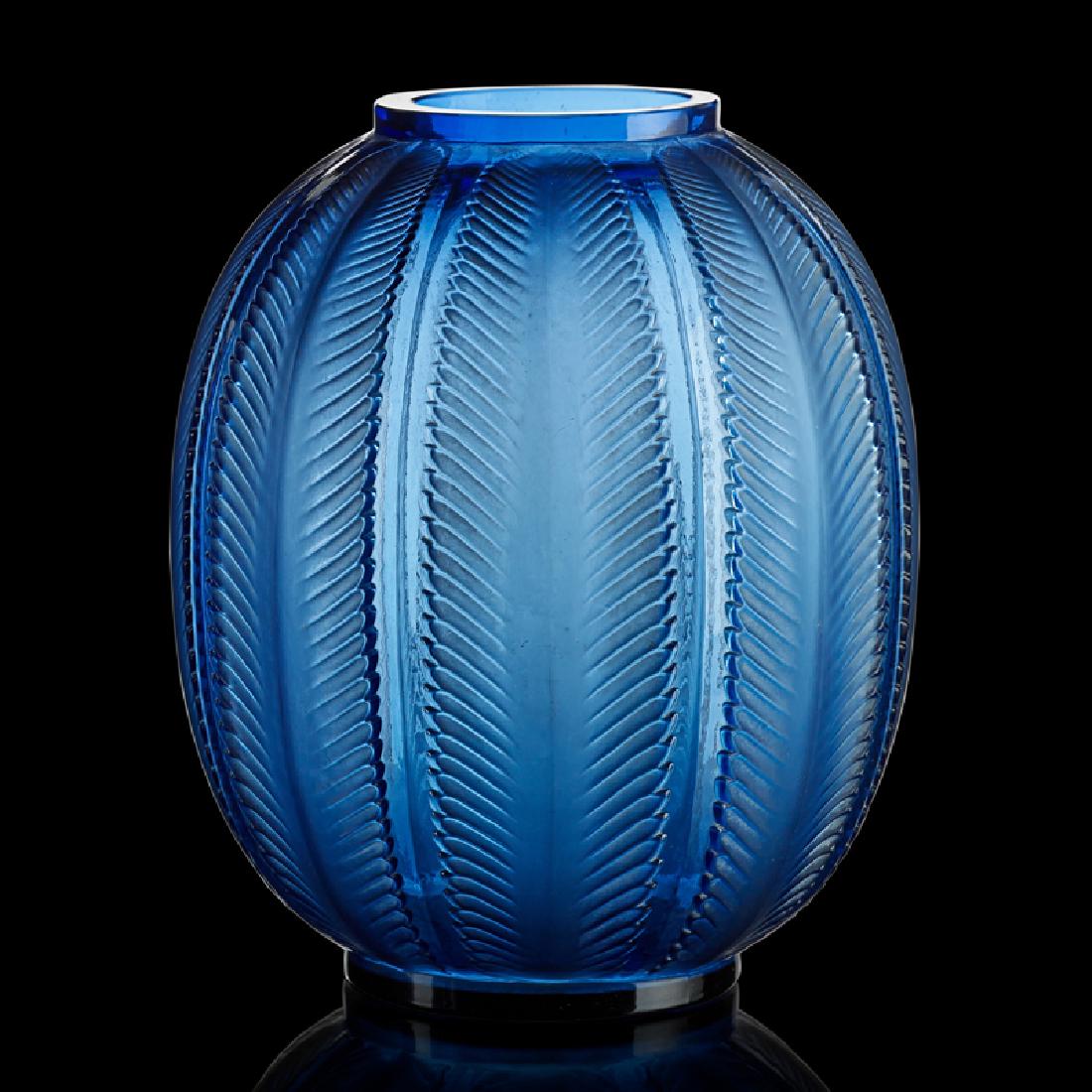 LALIQUE "Biskra" vase: LALIQUE "Biskra" vase, France, des. 1932 M p. 455, no. 1078 Clear and frosted cornflower blue glass R. LALIQUE FRANCE acid stamp 11 1/8" x 8 1/2"