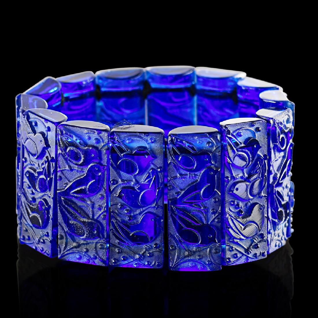 LALIQUE "Mésanges" bracelet: LALIQUE "Mésanges" bracelet, France, des. 1928 M p. 534, no. 1334 Cobalt blue glass Etched R. Lalique France 1 1/2" x 2 1/4" dia.
