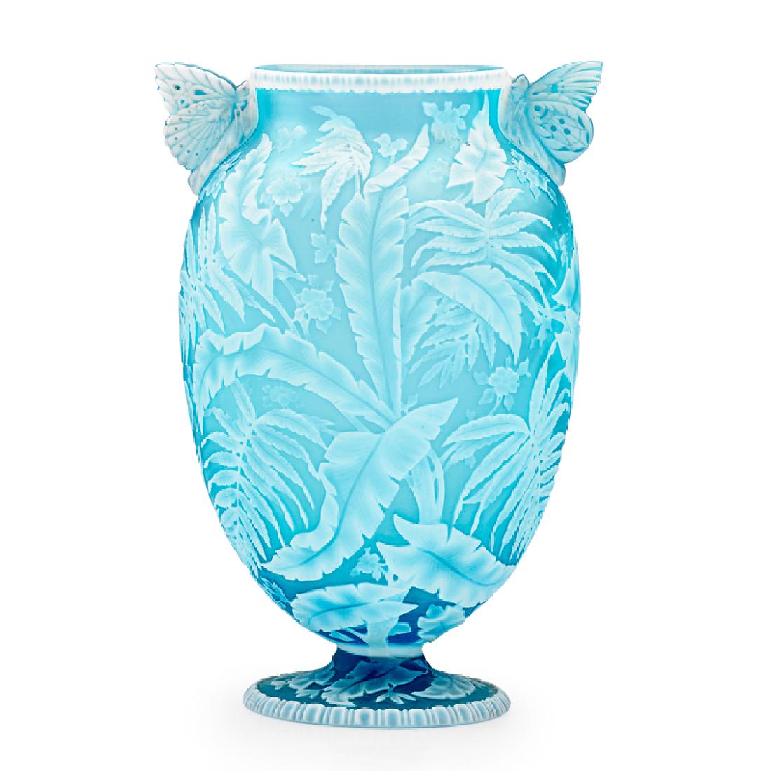 THOMAS WEBB & SONS Exceptional cameo vase: THOMAS WEBB & SONS Exceptional vase with palm fronds, ferns, blossoms, and butterfly handles, England, late 19th C. Acid-etched and wheel-carved cameo glass Unmarked 7 3/4" x 5 1/2" Provenance: Privat