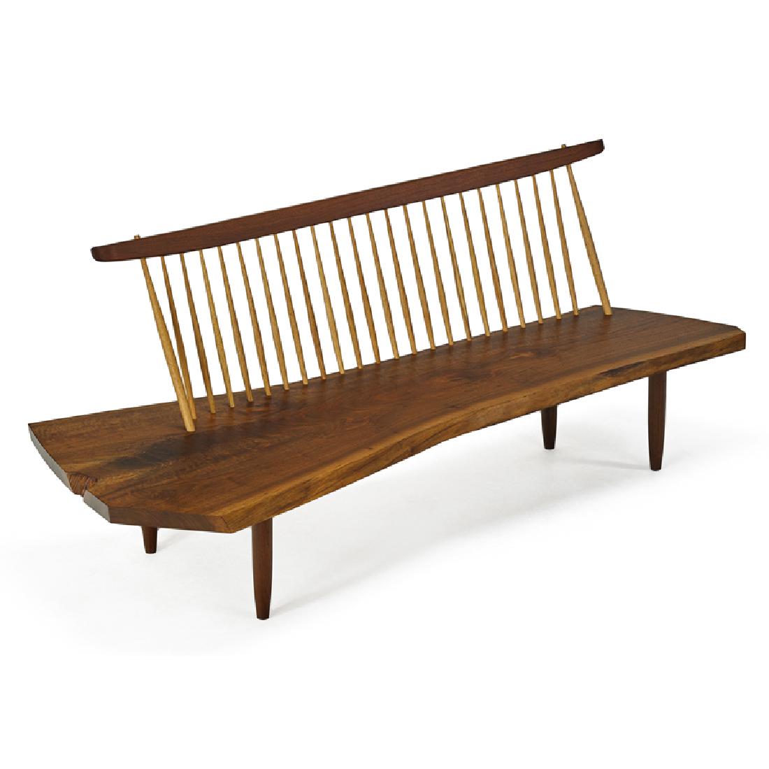 MIRA NAKASHIMA Conoid Bench with Back: MIRA NAKASHIMA (b. 1942) NAKASHIMA STUDIO Conoid Bench with Back, New Hope, PA, 1993 Walnut, hickory Unmarked 31 1/2" x 85" x 34" The proceeds of lots 1175–1178 will benefit the Nakashima Foundation