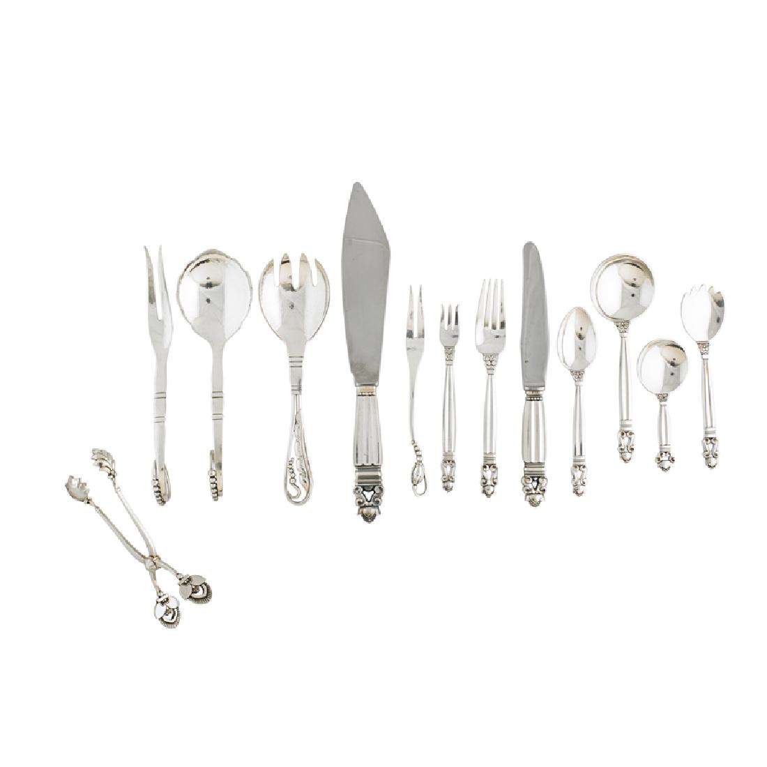 GEORG JENSEN 73-piece Sterling flatware: JOHAN ROHDE (1856 - 1935) GEORG JENSEN 73-piece assembled sterling flatware set, Denmark, after 1945: Acorn six-piece setting for twelve (missing six) and six serving pieces in Acorn and Blossom-style