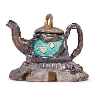 ROBERT ARNESON Teapot on base: ROBERT ARNESON (1930 - 1992) "Not Selected by the US Olympic Comm.," California, 1969 Glazed earthenware Teapot lid stamped with title, teapot incised Arneson '69, base stamped LOOKS LIKE SOME OF THAT