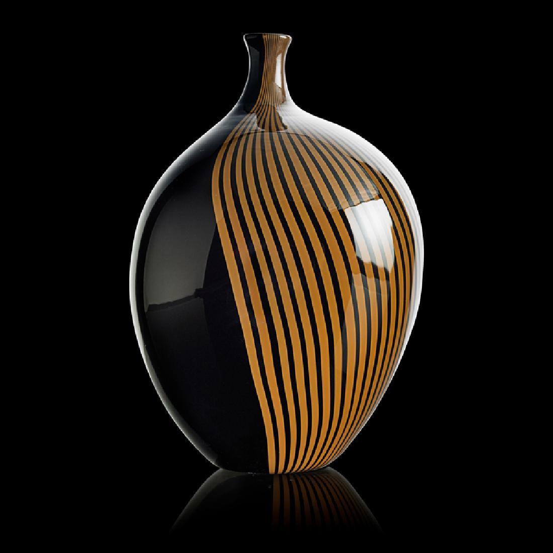 LINO TAGLIAPIETRA; EFFETRE Glass vase: LINO TAGLIAPIETRA (b. 1934) EFFETRE INTERNATIONAL Vase, Murano, Italy, 1982 Blown glass Etched LINO TAGLIAPIETRA F31 MURANO 72/100 1982, original Oggetti decal label 9 1/2" x 6"