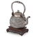 CHINESE SILVER REPOUSSE TEAPOT ON STAND