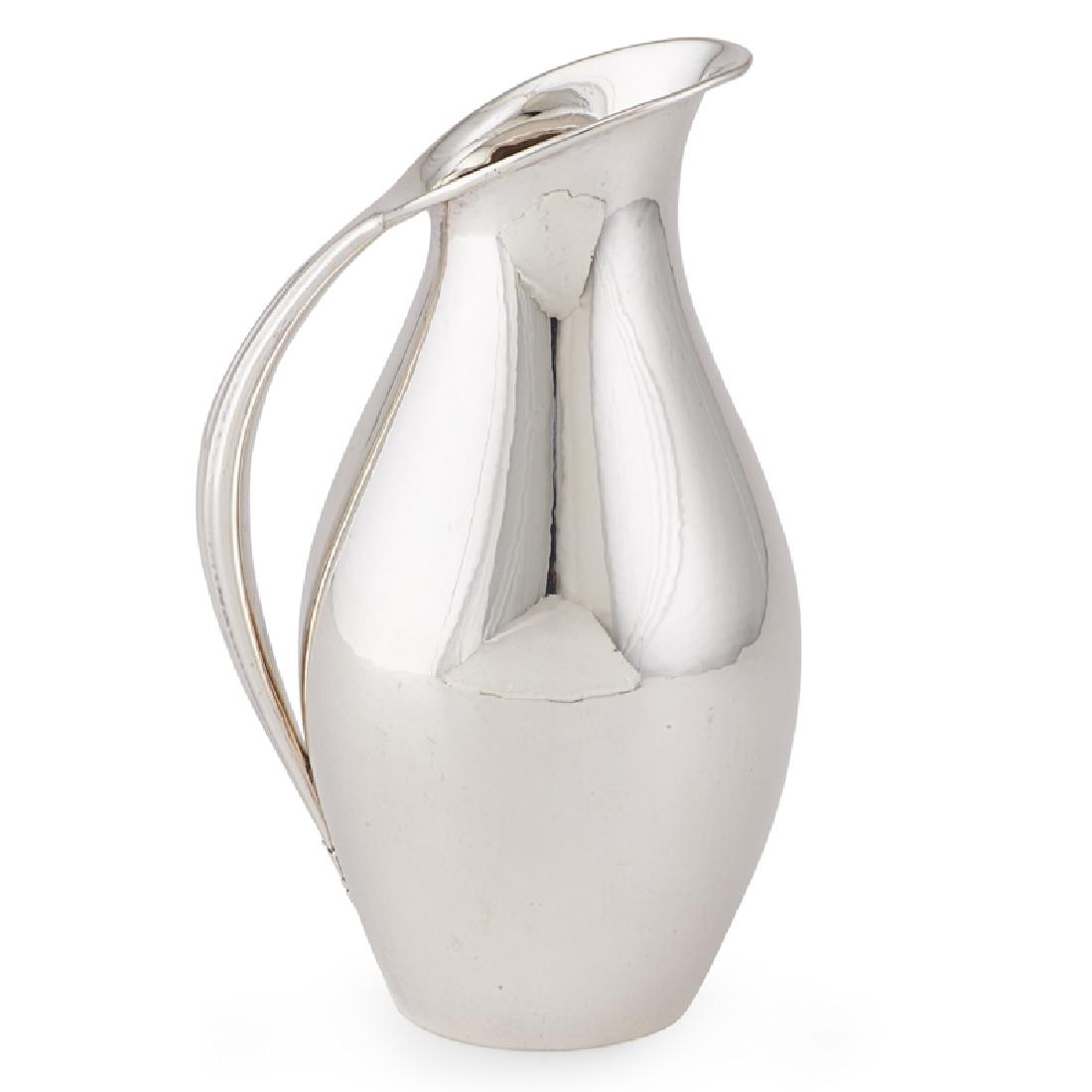 GEORG JENSEN STERLING SILVER WATER PITCHER: Designed by Johan Rohde, no. 432A, Denmark, 1933-44 Marked 9" 17.3 OT