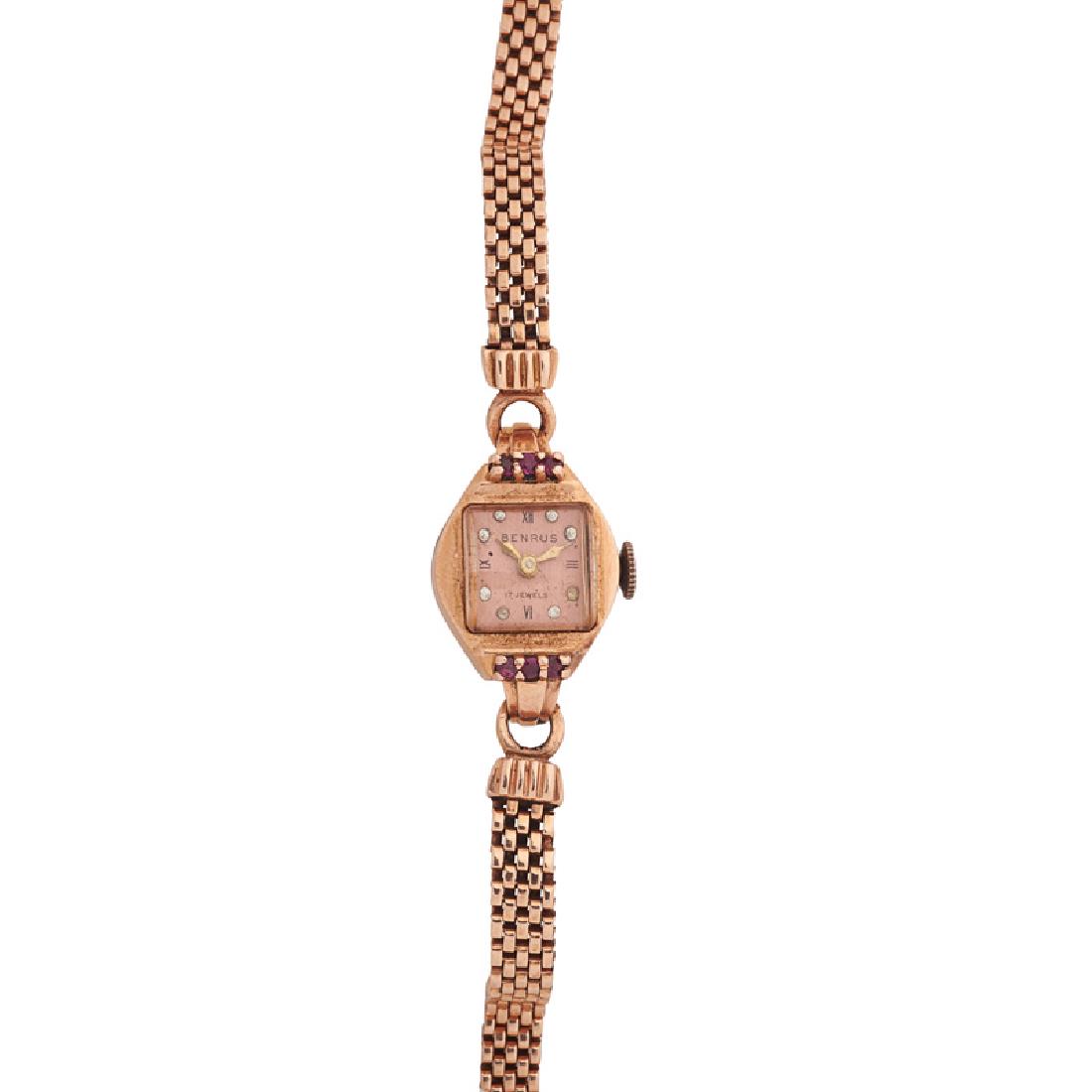 LADY'S RETRO RUBY & ROSE GOLD BRACELET WATCH: The square Benrus dial with Roman numeral or RBC diamond hours, approx. .04 ct. TW, and a Benrus Watch Co. Inc. Swiss seventeen jewels unadjusted movement, model AB 2. in round faceted ruby set case o