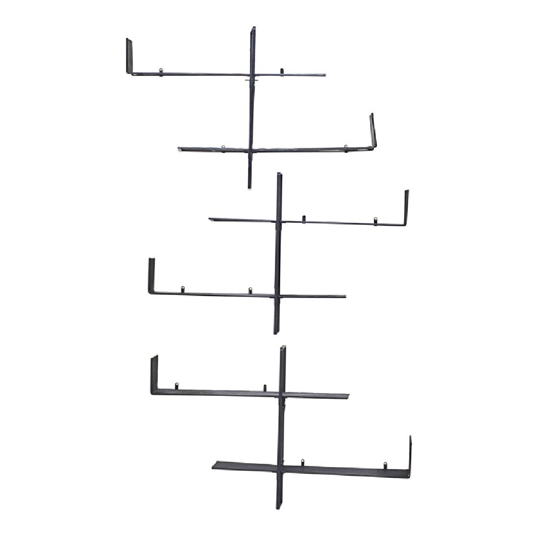 STYLE OF MATHIEU MATEGOT WALL SHELVES: Three enameled metal units, France, 1950s Each: 19" x 32" x 7 1/2"