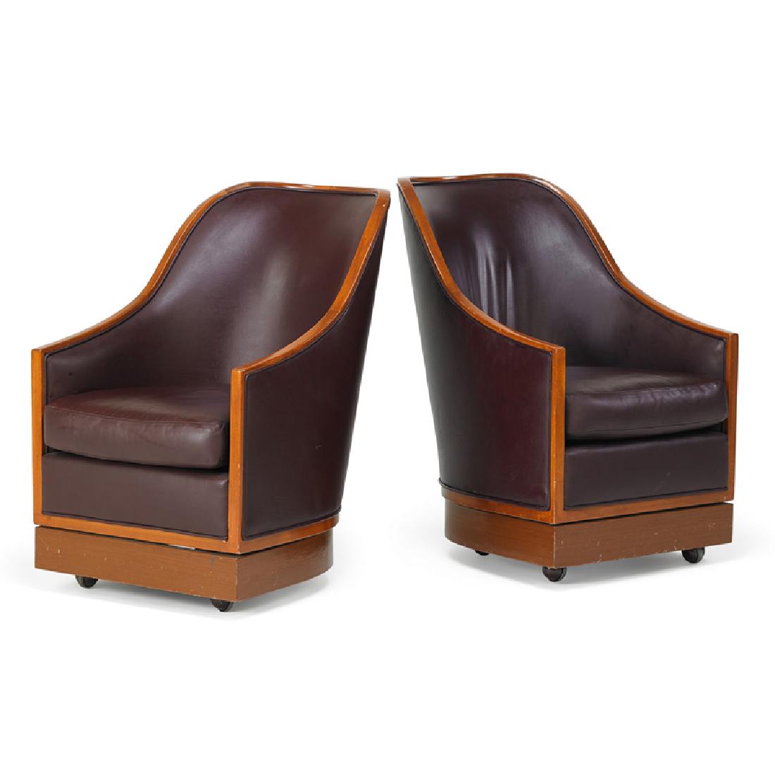 I.M. PEI Pair of swivel lounge chairs: I.M. PEI (b. 1917) Pair of lounge swivel chairs from the Four Seasons Hotel, New York, 1994 Cherry, leather, casters Brass plate with markings to one 37" x 25 1/2" x 26" ea.