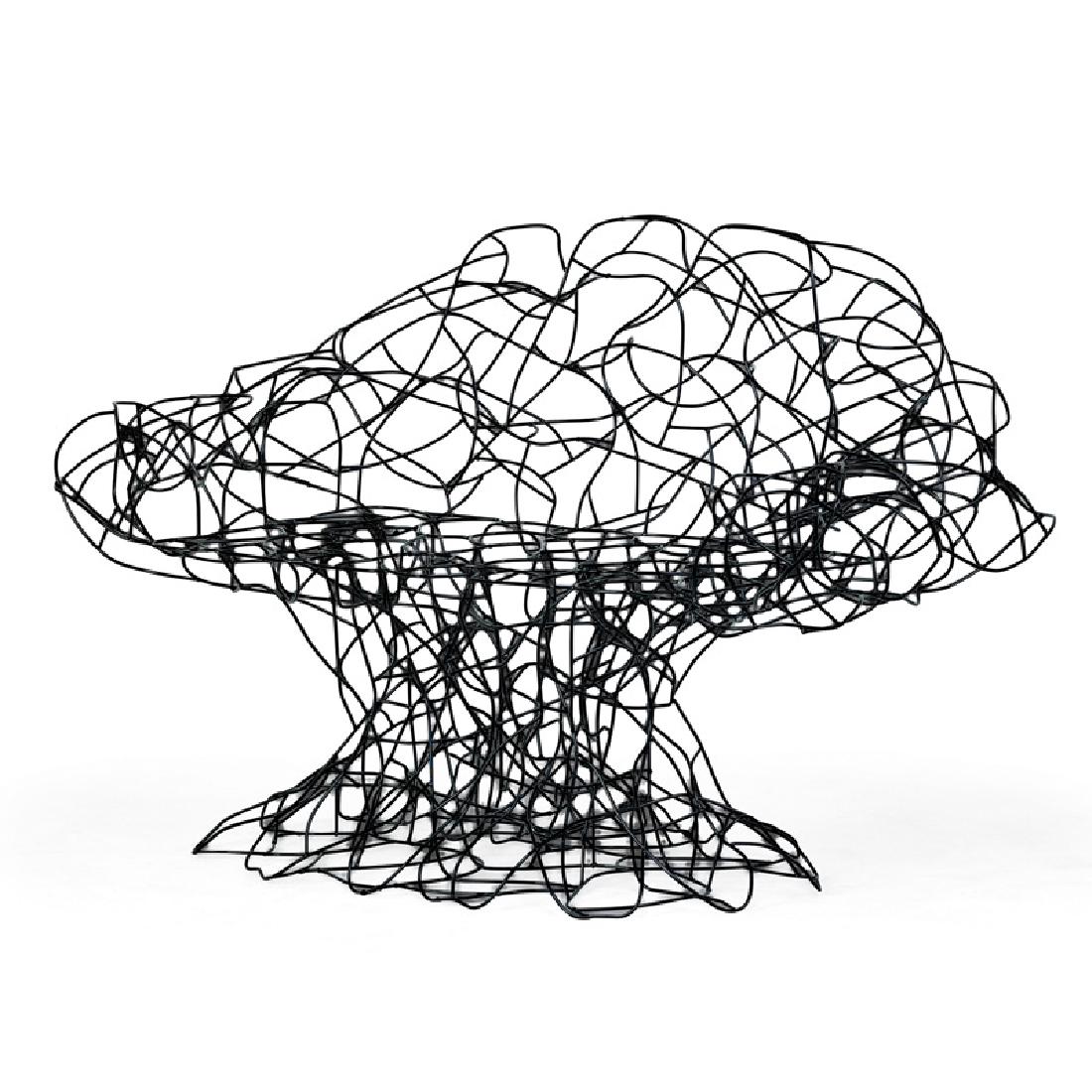 FERNANDO AND HUMBERTO CAMPANA Corallo chair: FERNANDO CAMPANA (b. 1961) HUMBERTO CAMPANA (b. 1953) EDRA Corallo chair, Italy, 2004 Bent, welded, and enameled steel wire Metal manufacturer label 32008E 35 1/2" x 57" x 34"