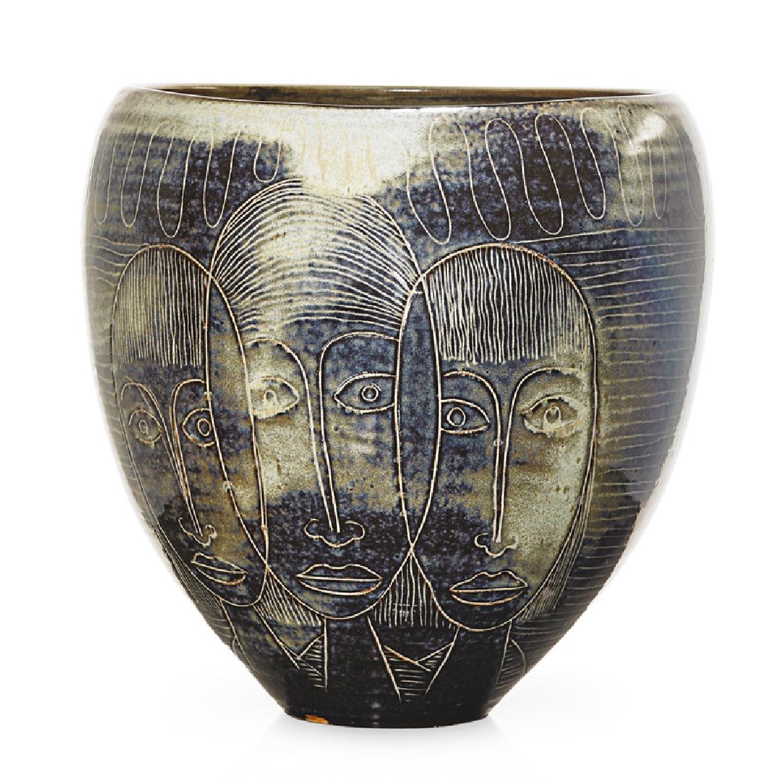 EDWIN AND MARY SCHEIER Fine large early vessel: EDWIN SCHEIER (1910 - 2008) MARY SCHEIER (1908 - 2007) Fine large early ovoid vessel with faces, 1950s-60s Glazed earthenware Incised Scheier 10" x 10" x 9" Provenance: Estate of Karl Drerup