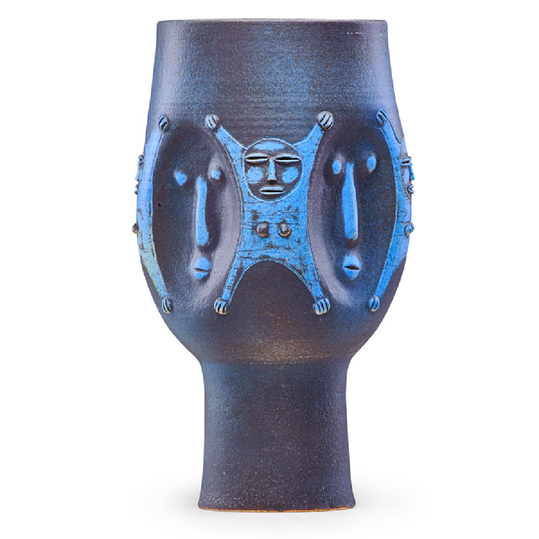EDWIN AND MARY SCHEIER Fine large early vessel: EDWIN SCHEIER (1910 - 2008) MARY SCHEIER (1908 - 2007) Fine large early vessel with figures and faces, 1950s-60s Glazed earthenware Incised Scheier 14" x 7" Provenance: Estate of Karl Drerup