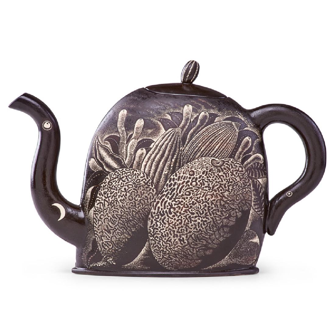 KURT WEISER Teapot: KURT WEISER (b. 1950) "Night Garden" teapot with melons and foliage, Tempe, AZ, ca. 1997 Sgraffito-decorated glazed porcelain Signed 8 1/2" x 13" x 3 3/4" Provenance: Joanne Rapp Gallery, Scottsdale,