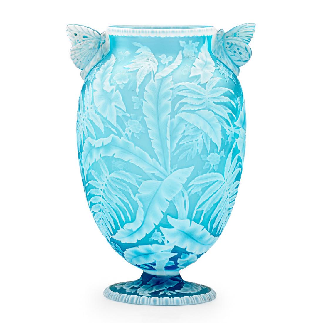 THOMAS WEBB & SONS Exceptional cameo vase: THOMAS WEBB & SONS Exceptional vase with palm fronds, ferns, blossoms, and butterfly handles, England, late 19th C.; Acid-etched and wheel-carved cameo glass; Unmarked; 7 3/4" x 5 1/2"; Provenance: Pr