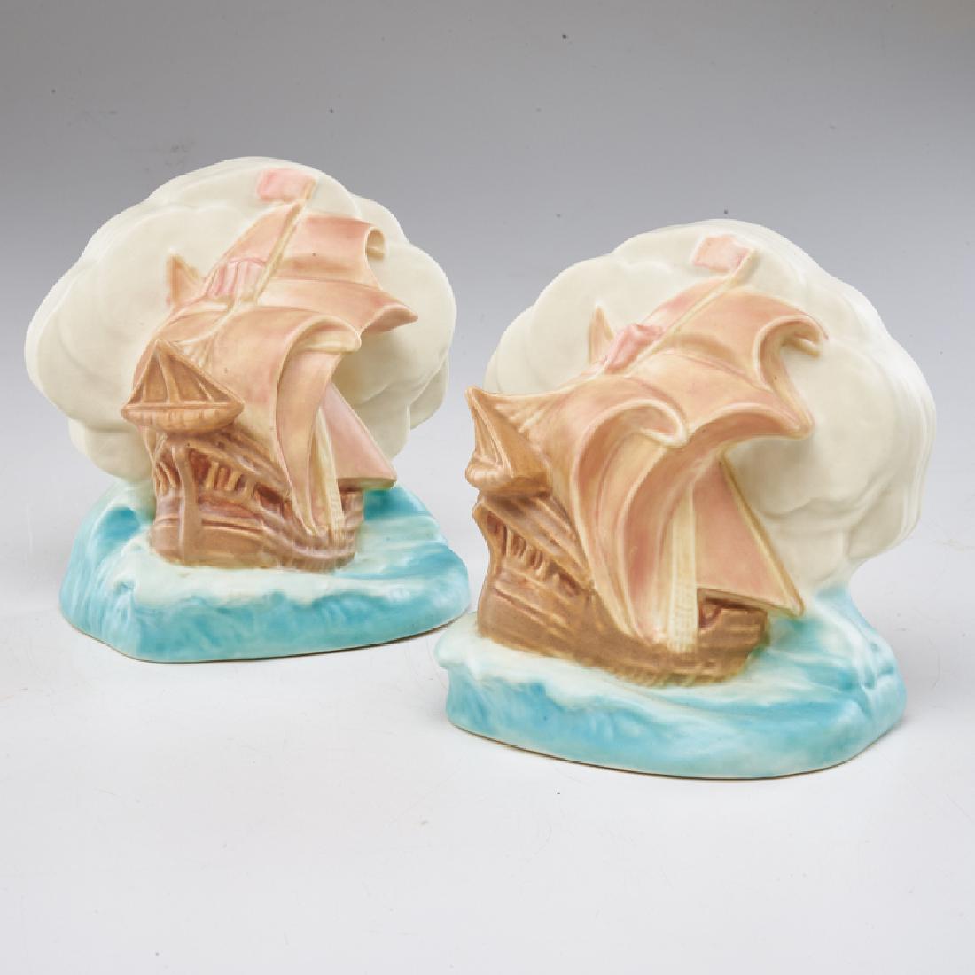 WILLIAM McDONALD (1892-1931); ROOKWOOD: Polychrome ship bookends, Cincinnati, OH, 1953 Flame mark, date, model, and artist's cipher 5 1/2" x 5 1/2" x 3"