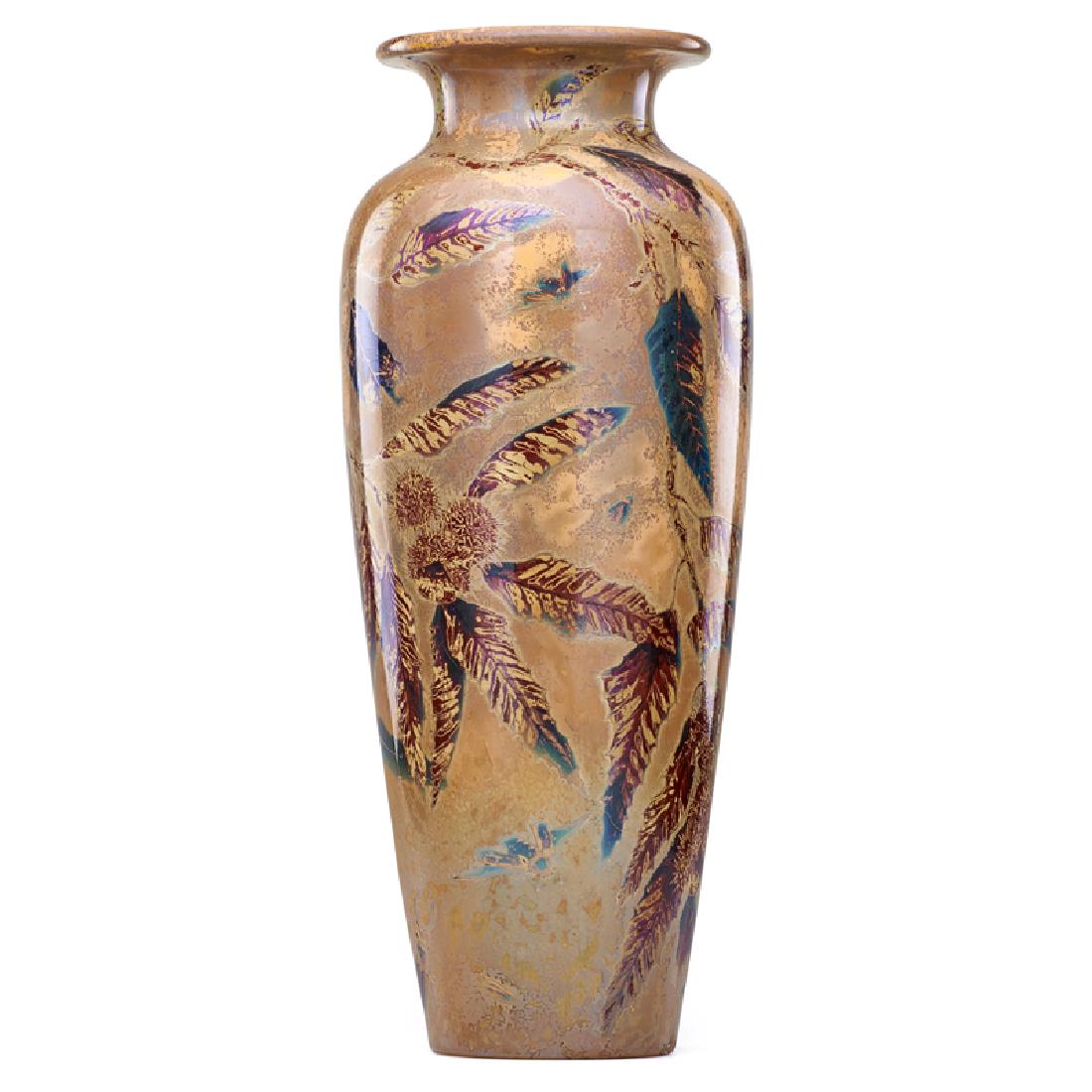 DELPHIN MASSIER: Glazed ceramic floor vase with leafy chestnut branches, Vallauris, France, 1890s Signed Delphin Massier Vallauris 24" x 9" Provenance: Collection of Jerome Shaw, Florida