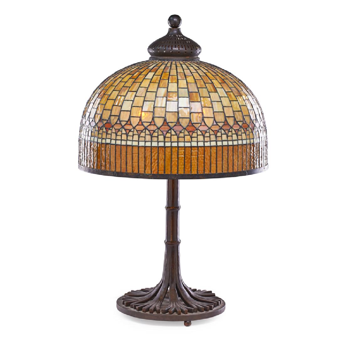 STYLE OF TIFFANY STUDIOS: Large contemporary table lamp with mosaic "fringe" shade and base with stylized roots, late 20th c. Leaded slag glass, textured glass, patinated brass Unmarked 38" x 24" dia.