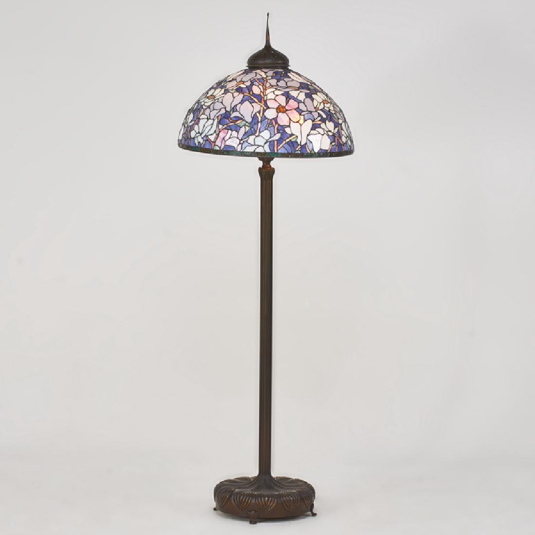 STYLE OF TIFFANY STUDIOS: Contemporary "Dogwood" floor lamp, late 20th c. Patinated brass, leaded slag glass, textured glass 79" x 28" dia.