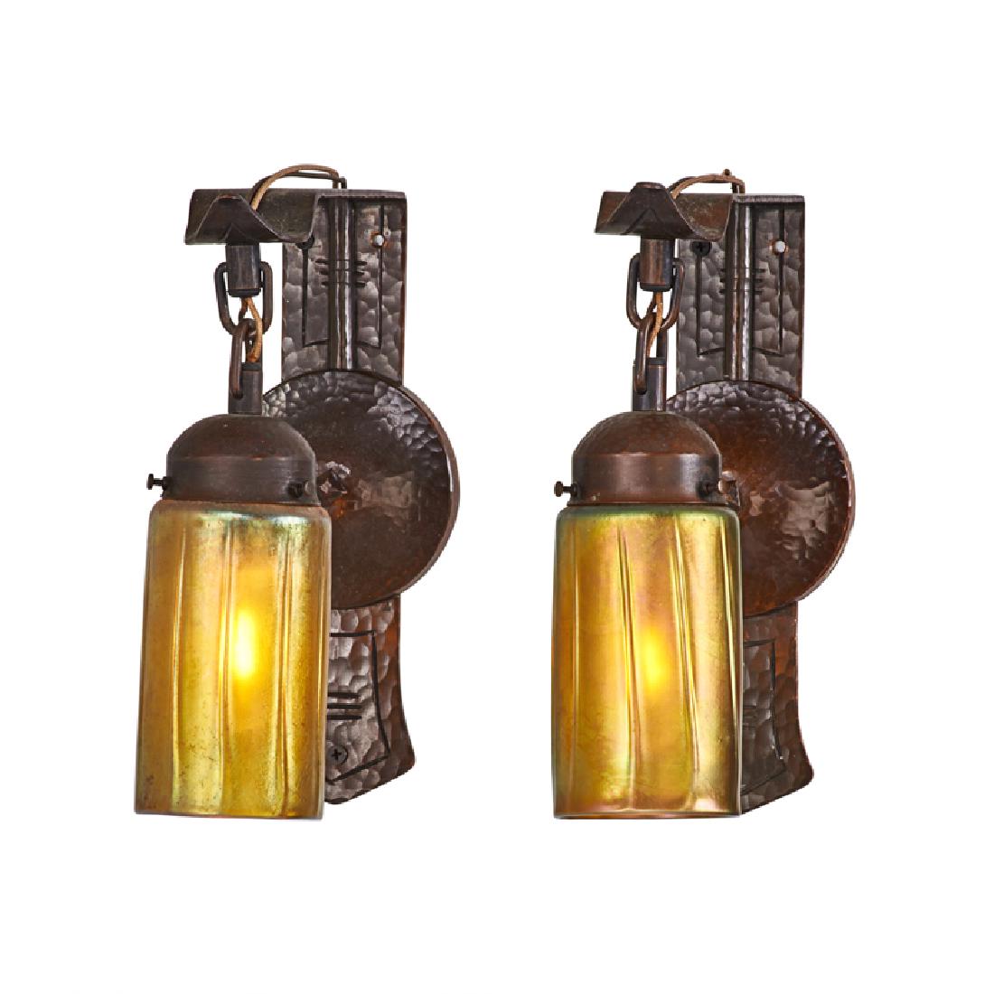 MICHAEL ADAMS; AURORA STUDIOS: Contemporary pair of sconces with Lundberg Studio shades, Oswego, NY, 1980s Hammered copper, blown glass, single sockets Sconces unmarked, shades signed 10" x 4" x 8 3/4" ea. One sconce missing a set