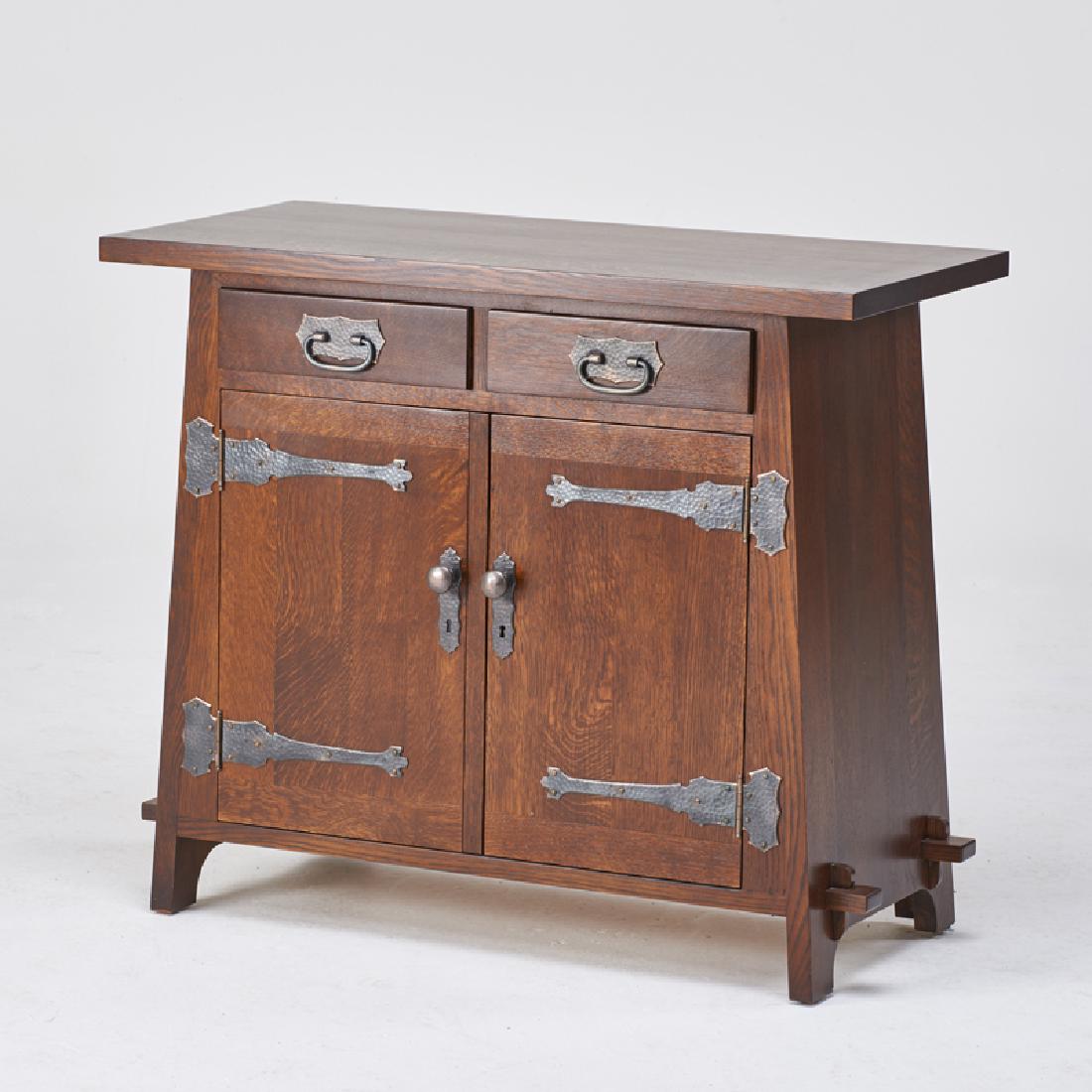 STICKLEY; E.J. AUDI: Contemporary trapezoidal server in the style of Roycroft, Manlius, NY, 2000s Quartersawn oak, patinated metal Branded mark, metal tag, carved orb and cross 34" x 40" x 19 3/4"