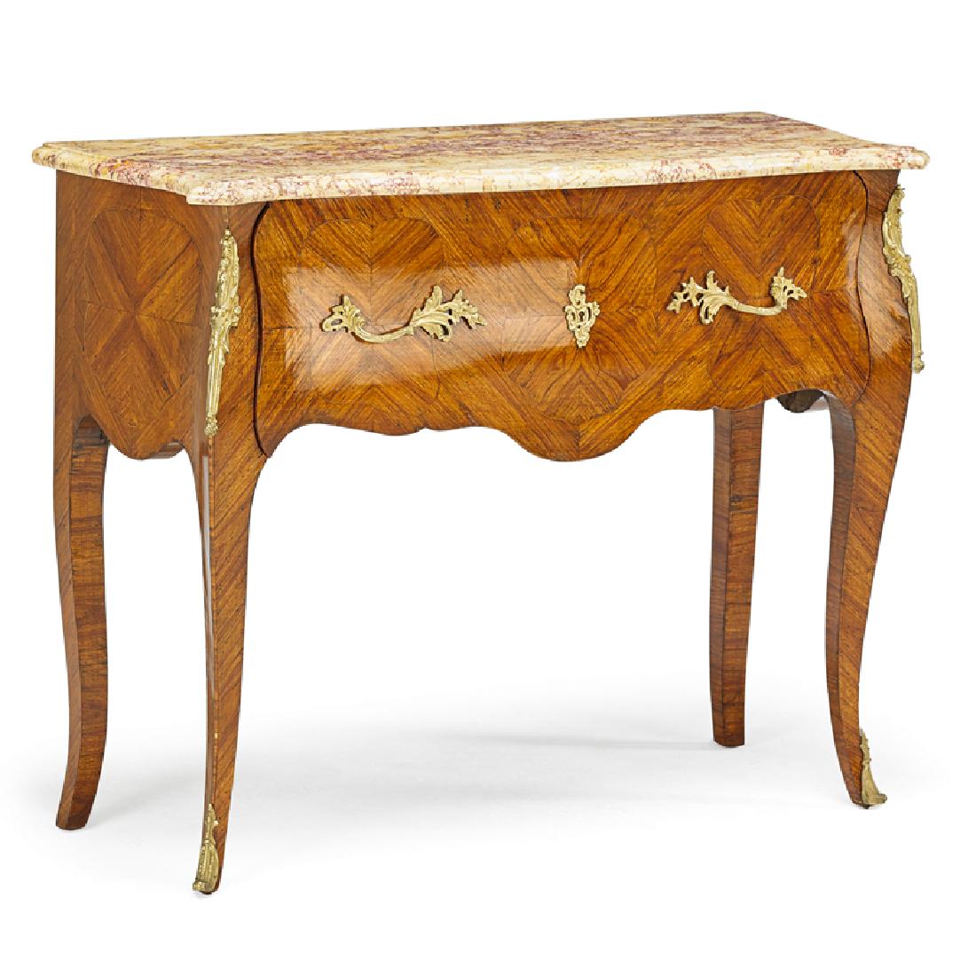 LOUIS XV STYLE: Commode with serpentine outline above one drawer on cabriole legs, France, late 19th c. Marble, tulipwood, brass-washed metal 34 1/2" x 41 1/2" x 17 1/2" Provenance: Christian Du Pont Collection Fine 